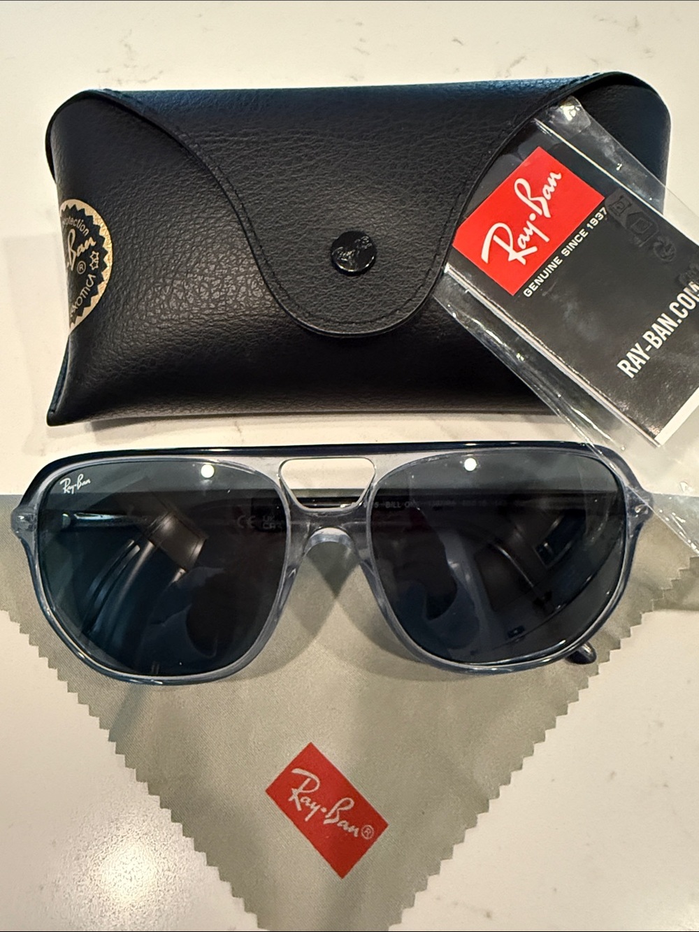 Ray-Ban BlueTranslucent Frame Sunglasses with Blue Lenses